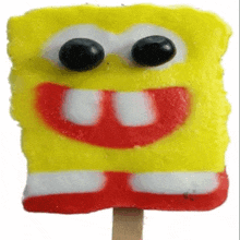 a spongebob ice cream popsicle with a big smile on it 's face