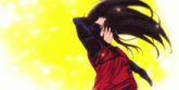 a woman with long black hair is wearing a red top