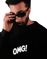 a man wearing sunglasses and a shirt that says omg on it