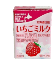 a carton of hokkaido hidaka milk products with strawberries on it