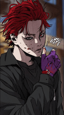 a man with red hair is wearing a purple glove