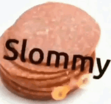 a close up of a stack of sausages with the word slommy written on it .