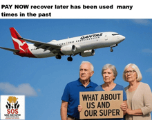a group of people holding a sign that says what about us and our super in front of a qantas plane