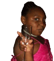 a young girl in a pink dress is holding a glass