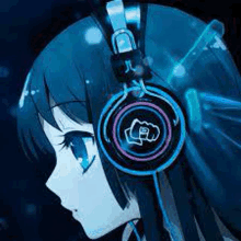 a girl is wearing headphones with a fist on them .