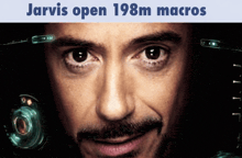 a close up of a man 's face with the words jarvis open 198m macros below him