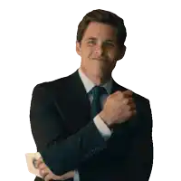 a man in a suit and tie is holding a piece of paper with a picture of a man on it