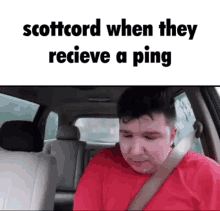 a man in a red shirt is sitting in a car with the words scottcord when they recieve