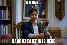 a man sitting at a table holding a telescope with a caption that says no one gabriel delerin is here