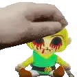 a hand is petting a stuffed animal with blood on its face .