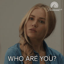 a woman with a braided hair is asking who are you
