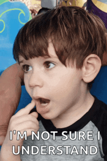 a young boy with a surprised look on his face and the words " i 'm not sure i understand " below him