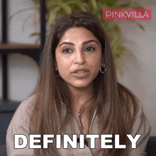 a woman says " definitely " in front of a pinkvilla ad