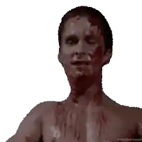 a shirtless man with blood on his face is screaming