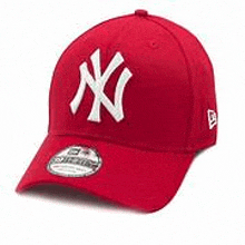 a red new york yankees hat with a white logo on it .