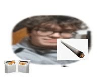 a man with glasses is smoking a cigarette next to two packs of cigarettes