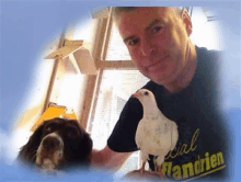 a man holding a pigeon next to a dog wearing a shirt that says ' special handrien '