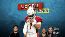 a cardinals football player stands in front of a sign that says " loser murr "