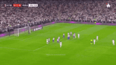a soccer game between atm and rma is being shown on a screen