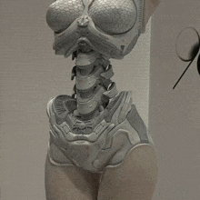 a 3d model of a female robot with a very detailed body