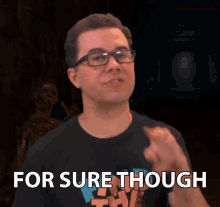 a man wearing glasses pointing at something with the words for sure though