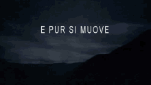 e pur si muove is written in white on a black background