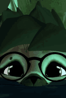 a cartoon cat wearing glasses and a green hat