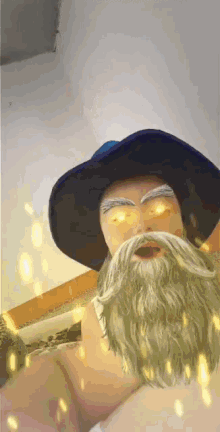 a man with a beard wearing a hat and a wizard 's hat