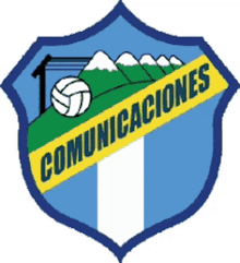 a blue and white shield with a volleyball and the words comunicaciones on it