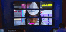 a man is looking at a screen with a tiger logo