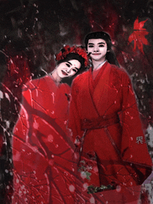 a man and a woman in red kimonos with chinese writing