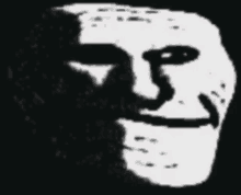 a black and white image of a troll face with a beard