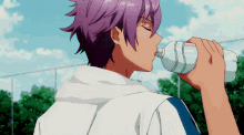 a person with purple hair drinking from a plastic bottle