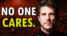 a man with a beard and curly hair stands in front of a sign that says no one cares