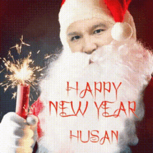 a santa claus holding a sparkler and the words happy new year hasan