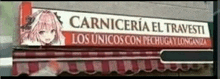 a store front with a sign that says carniceria el travesti