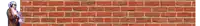 a brick wall with a person standing behind it
