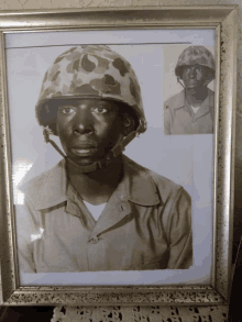 a framed picture of a man in a military uniform