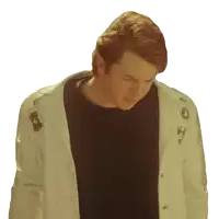 a man in a black shirt and a white coat has a badge on his jacket that says ' a ' on it