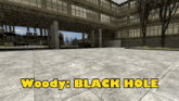 woody 's black hole is written in yellow letters on a tiled floor
