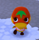 a stuffed animal with a green leaf on its head