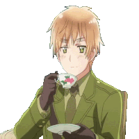 a man in a green jacket and tie is drinking from a cup with flowers on it