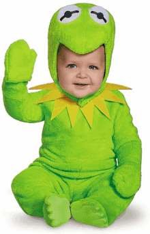 a baby in a kermit the frog costume is sitting down