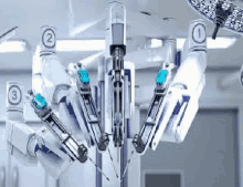 a robotic arm is being used in an operating room to perform surgery .