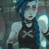 a woman with blue hair and a black top with a cross on the front