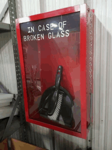 a red box that says " in case of broken glass " on it