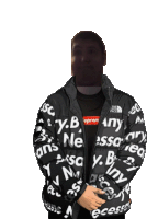 a man is wearing a black jacket with supreme written all over it