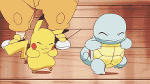 a pikachu and squirtle are standing next to each other