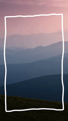 a drawing of a mountain range with a white frame around it
