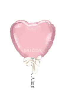 a pink heart shaped balloon with a white bow on a white background